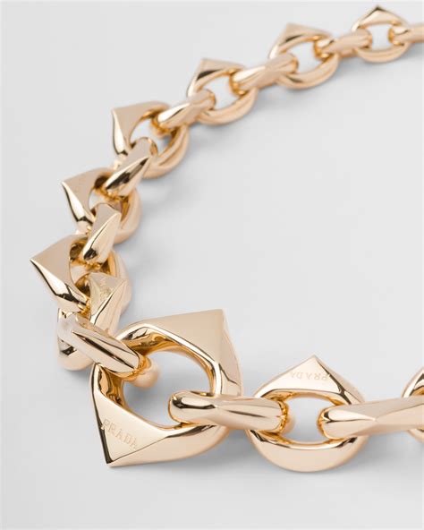 gold prada necklace